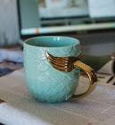 taza de ceramica celeste 